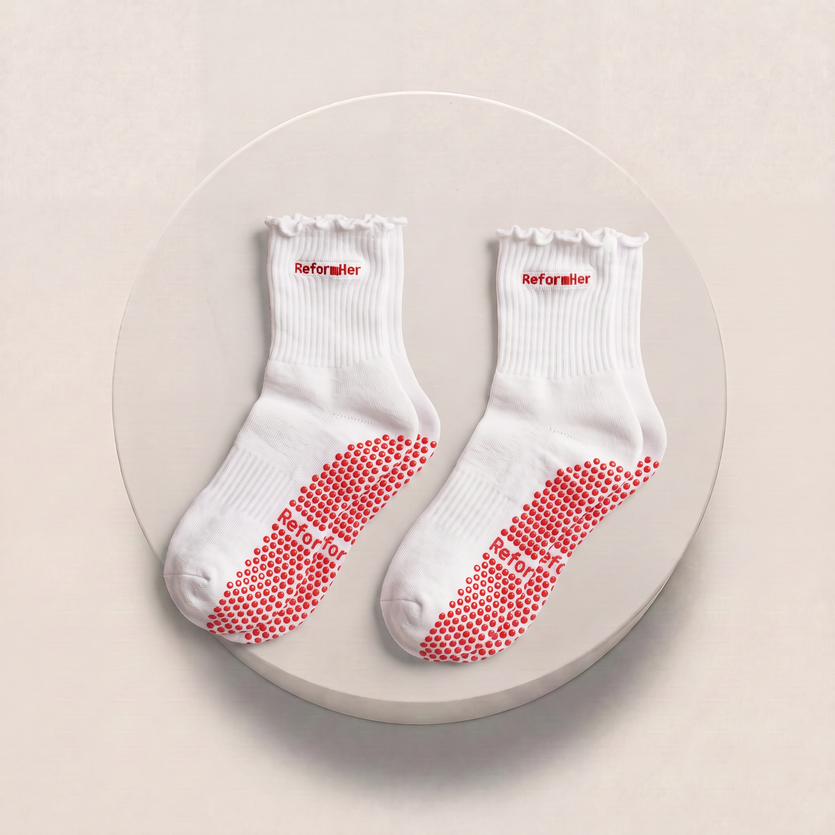 womans pilates grip socks in white and red