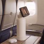 phone on airplane attached on water bottle