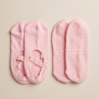 tvåpack rosa ballerina pilates strumpor mot beige bakgrund